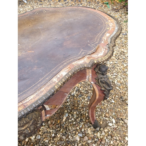 400 - IVOR NOVELLO’S WRITING TABLE, A 19TH CENTURY FRENCH KINGWOOD AND GILT BRONZE MOUNTED
The banded cart... 