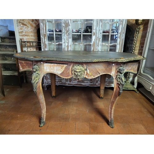 400 - IVOR NOVELLO’S WRITING TABLE, A 19TH CENTURY FRENCH KINGWOOD AND GILT BRONZE MOUNTED
The banded cart... 