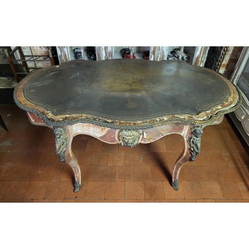 400 - IVOR NOVELLO’S WRITING TABLE, A 19TH CENTURY FRENCH KINGWOOD AND GILT BRONZE MOUNTED
The banded cart... 