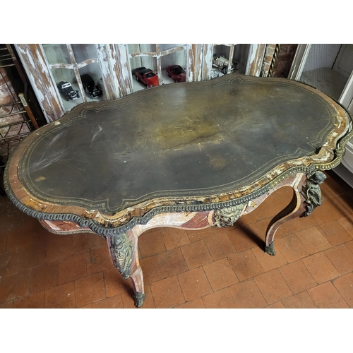 400 - IVOR NOVELLO’S WRITING TABLE, A 19TH CENTURY FRENCH KINGWOOD AND GILT BRONZE MOUNTED
The banded cart... 