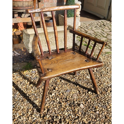 406 - AN 18TH CENTURY WELSH PRIMITIVE ELM LOW STICK CHAIR.
(w 66cm x d 46cm x h 77cm)

Condition: good, in... 