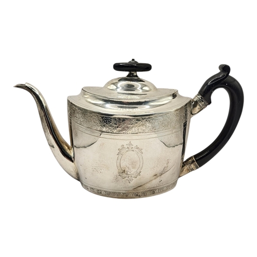 42 - A GEORGIAN SILVER OVAL TEAPOT
With ebonised wooden finial and handle and enrgraved decoration to bor... 