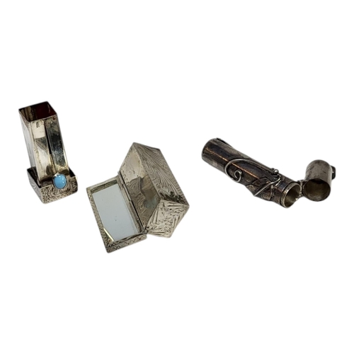 73 - TWO 20TH CENTURY SILVER RECTANGULAR LIPSTICK HOLDERS
Set with a turquoise cabochon stone and hinged ... 