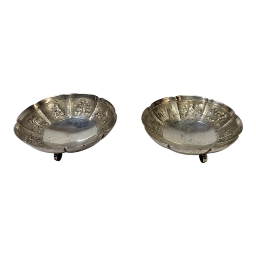 84 - A PAIR OF CONTINENTAL STERLING SILVER SWEETMEAT DISHES
Having fine embossed decoration of elephants ... 