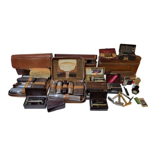 176 - AN EXTENSIVE COLLECTION OF EARLY 20TH CENTURY MEN'S TOILETRIES TRAVELLING SHAVING SETS
Comprising ea... 