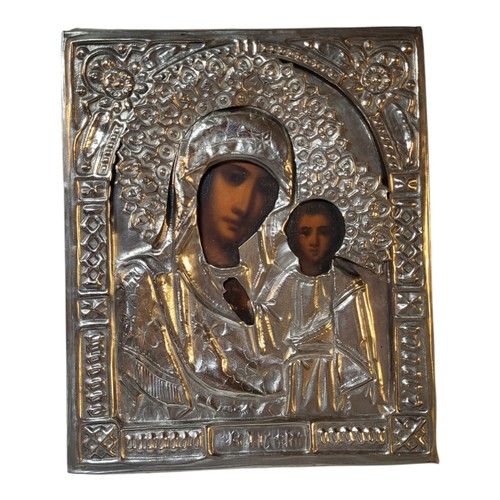 216 - A RUSSIAN ORTHODOX HOLY ICON OF THE VIRGIN MARY, MOTHER OF GOD AND JESUS, CIRCA 1900
Set with white ... 