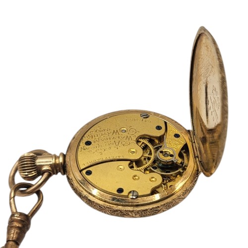 63A - A 19TH CENTURY AMERICAN YELLOW METAL LADIES’ POCKET WATCH AND CHAIN
Engraved decoration to vase with... 