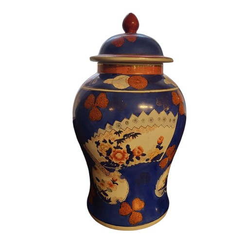 248 - A 20TH CENTURY CHINESE BALUSTER HARD PASTE PORCELAIN BLUE GLAZED JAR AND COVER
Polychrome painted wi... 