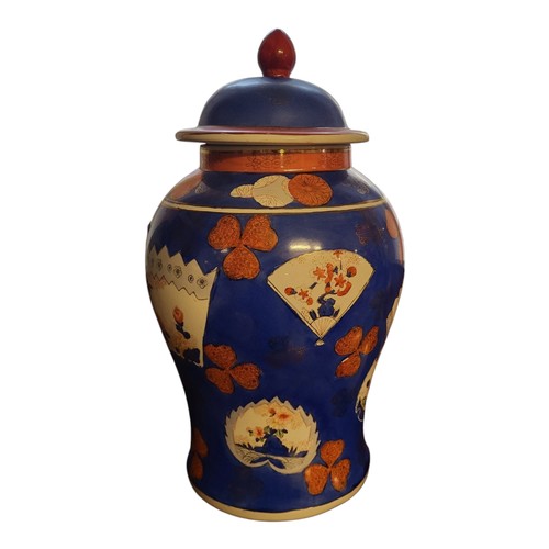 248 - A 20TH CENTURY CHINESE BALUSTER HARD PASTE PORCELAIN BLUE GLAZED JAR AND COVER
Polychrome painted wi... 