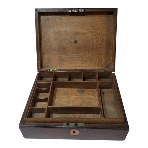 249 - AN EARLY 19TH CENTURY OAK AND BRASS SEWING BOX
Plain form with fitted pull out tray,bearing engraved... 