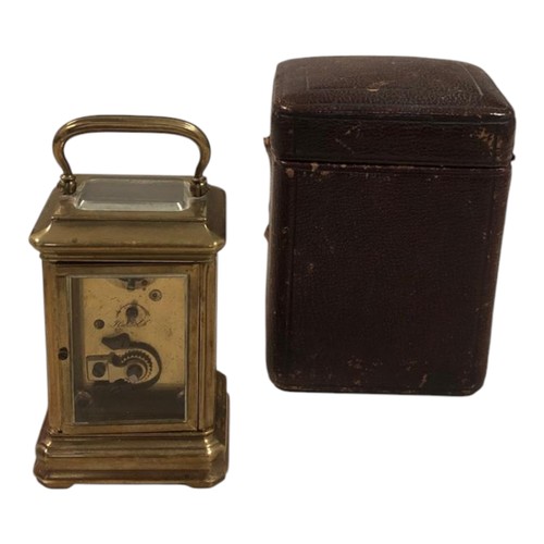 384 - A 19TH CENTURY FRENCH MINIATURE BRASS CASED CARRIAGE CLOCK 
Eight day leather traveling case.
(7.5cm... 