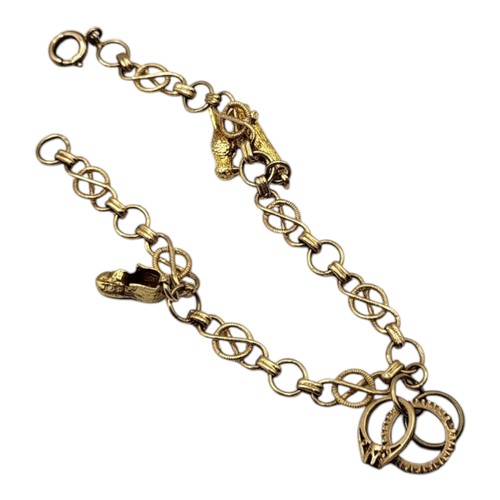 73A - A VINTAGE 9CT GOLD CHARM BRACELET
Pierced circular links set with three charms including a woodpecke... 