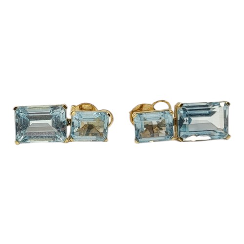 14B - A PAIR OF 18CT GOLD AND GEM SET DROP EARRINGS
Each set with baguette cut blue topaz stones.
(approx ... 