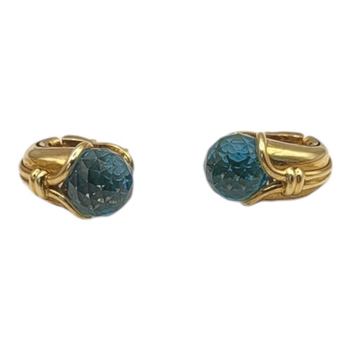 3B - BULGARI, A PAIR OF 18CT GOLD AND BLUE TOPAZ SET EARRINGS
Faceted blue tone stone in a cornucopia des... 