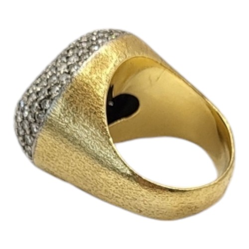 9B - A VINTAGE 18CT YELLOW METAL AND DIAMOND HEART FORM ‘BOMBE’ RING
Heavy gauge band with an arrangement... 