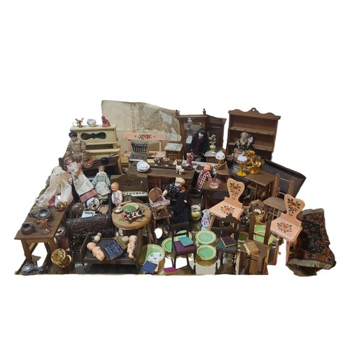 266 - A COLLECTION OF EARLY 20TH CENTURY AND LATER DOLLS AND DOLLS HOUSE FURNITURE
To include dressers, ch... 