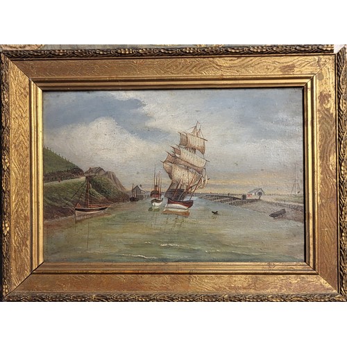 313 - AN EARLY 20TH CENTURY OIL ON CANVAS LAID TO BOARD, FISHING BOATS NEAR A HARBOUR
Gilt framed.
(42cm x... 