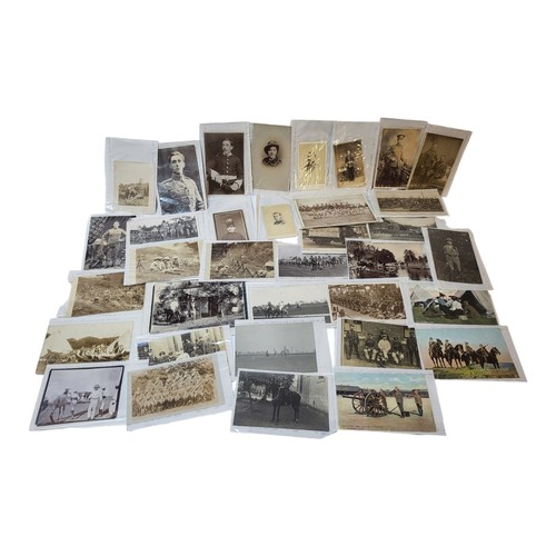 293 - A COLLECTION OF THIRTY VICTORIAN AND LATER BRITISH MILITARY PHOTOGRAPHS AND POSTCARDS
To include Tig... 