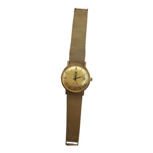 35A - TISSOT, A VINTAGE 9CT GOLD AUTOMATIC GENT’S WRISTWATCH
Gold tone dial with calendar window, marked ‘... 