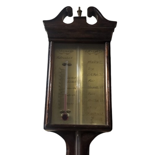 288 - THOMAS WRIGHT, A 20TH CENTURY MAHOGANY AND BRASS STICK BAROMETER
Having a broken pediment finial, br... 