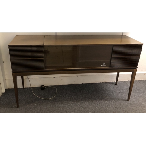 512 - A GRUNDIG KE 736 WE/FM STEREO RECORD/RADIO CONSOLE with original booklets Condition good throughout,... 