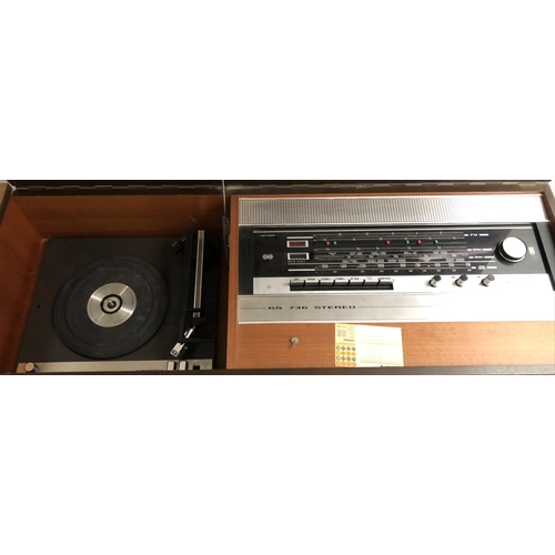 512 - A GRUNDIG KE 736 WE/FM STEREO RECORD/RADIO CONSOLE with original booklets Condition good throughout,... 