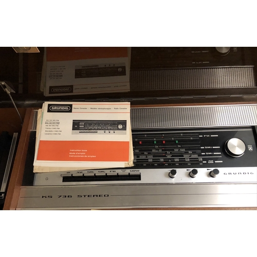 512 - A GRUNDIG KE 736 WE/FM STEREO RECORD/RADIO CONSOLE with original booklets Condition good throughout,... 