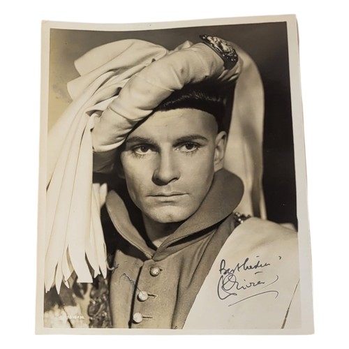 245 - LAURENCE OLIVIER, 1907 - 1989, AN EARLY BLACK AND WHITE PHOTOGRAPH, in costume for production of 'He... 