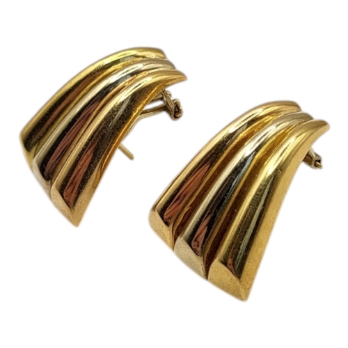 505 - A PAIR OF VINTAGE 18CT GOLD ‘FAN’ EARRINGS
Three flared flutes forming a fan design and stud back, m... 