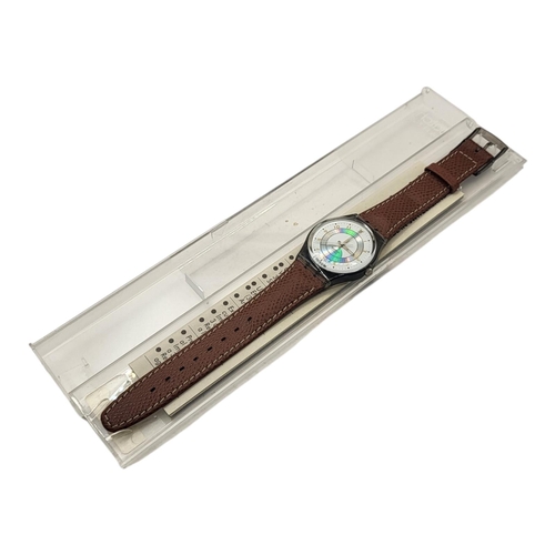 552 - A VINTAGE QUARTZ SWATCH AG 1991 WATCH
Swiss made with clear Perspex back and brown leather strap, in... 