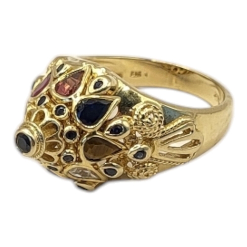 21 - A VINTAGE 14CT GOLD AND MULTI GEM ‘TUTTI FRUTTI’’ RIN
The central round cut sapphire edged with diam... 