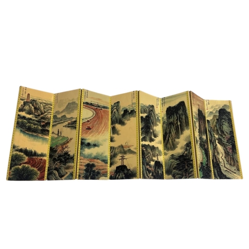 226 - A CHINESE EIGHT PANEL FOLDING BOOK
Titled 'When Haixia He looks at the mountains, she also looks at ... 