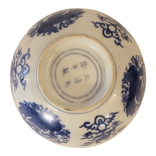 206 - A CHINESE BLUE AND WHITE PORCELAIN BOWL
With lotus and phoenix painted decoration, bearing Kangxi si... 