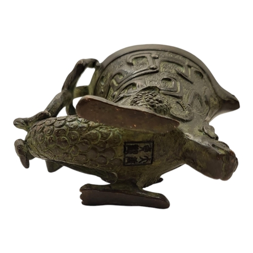 198 - A CHINESE ARCHAISTIC STYLE BRONZE 'DRAGON' WINE CUP
Bearing a four character mark to base.
(6cm x 8c... 