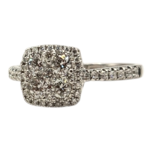 16 - AN 18CT WHITE GOLD AND DIAMOND CLUSTER RING
Having an arrangement of pave cut diamonds forming a squ... 