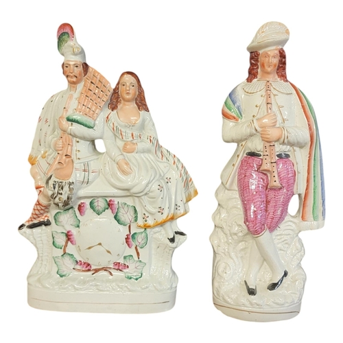 209 - A GOOD 19TH CENTURY STAFFORDSHIRE FIGURAL GROUP OF A SCOTTISH HIGHLAND DANCERS
Wearing traditional d... 