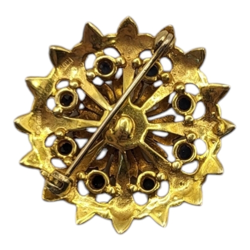 42 - A VINTAGE 9CT GOLD, SAPPHIRE AND SEED PEARL BROOCH
Having an arrangement of round cut sapphires in a... 