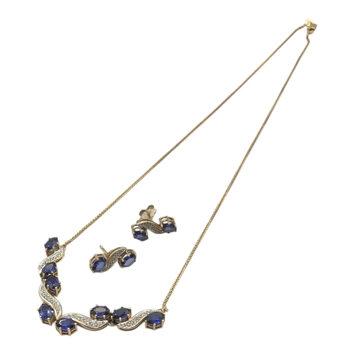 20 - A 14CT GOLD, SAPPHIRE AND DIAMOND NECKLACE AND EARRINGS SET
Set with oval cut sapphires interspersed... 