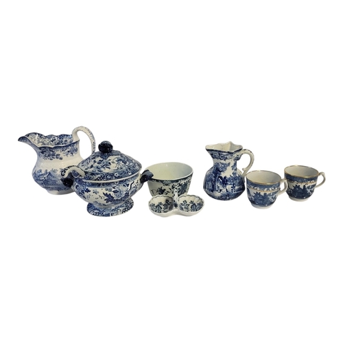 227 - A COLLECTION OF 18TH CENTURY AND LATER BLUE AND WHITE POTTERY AND PORCELAIN ITEMS 
To include two Ca... 