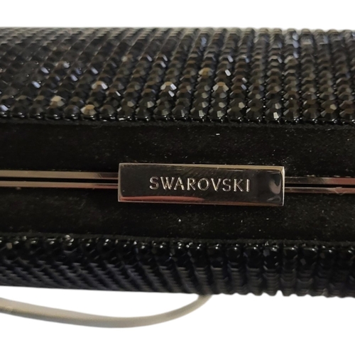 289 - SWAROVSKI, POWER JET, A VINTAGE BLACK CRYSTAL HANDBAG
Having chrome hanging chain, retaining origina... 