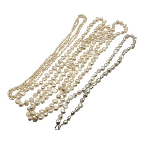 61 - A COLLECTION OF BAROQUE PEARL NECKLACES
To include a necklace with silver clasp.
(longest necklace a... 