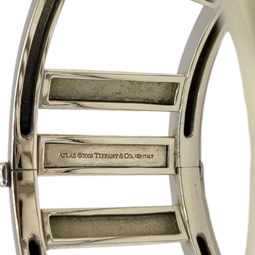 68 - TIFFANY, A VINTAGE 18CT WHITE GOLD ‘WIDE ATLAS’ BRACELET
The wide band with Roman numerals, marked ‘... 