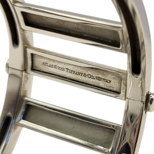 68 - TIFFANY, A VINTAGE 18CT WHITE GOLD ‘WIDE ATLAS’ BRACELET
The wide band with Roman numerals, marked ‘... 