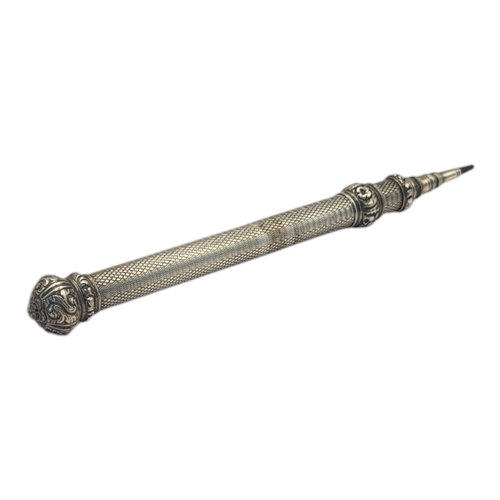 96 - A LARGE VICTORIAN WHITE METAL PROPELLING PENCIL
Having coronet finial and engine turned decoration.
... 