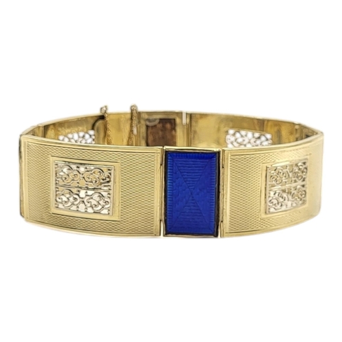 74 - A CONTINENTAL 14CT YELLOW METAL AND ENAMEL BRACELET
The rectangular blue guilloché enamel panels wit... 