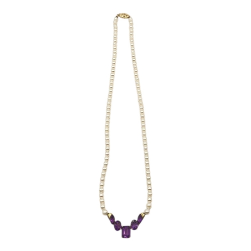 92 - A VINTAGE 10CT GOLD AND AMETHYST NECKLACE
Having an arrangement of baguette and oval cut amethyst st... 