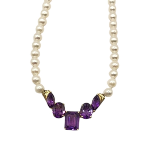 92 - A VINTAGE 10CT GOLD AND AMETHYST NECKLACE
Having an arrangement of baguette and oval cut amethyst st... 