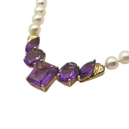 92 - A VINTAGE 10CT GOLD AND AMETHYST NECKLACE
Having an arrangement of baguette and oval cut amethyst st... 