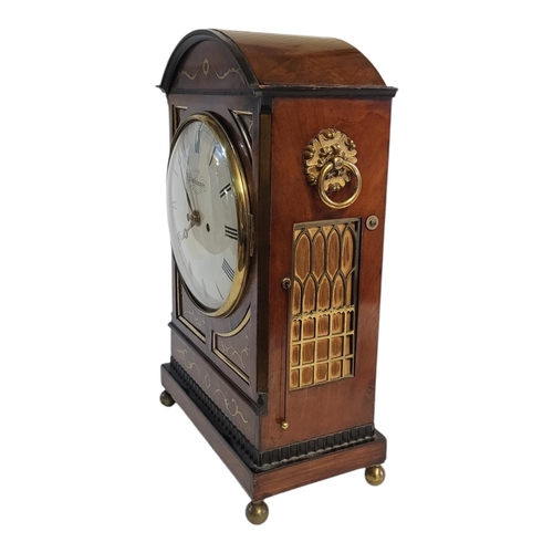 212 - J. YON, OF SOUTHAMPTON, AN EARLY 19TH CENTURY MAHOGANY AND BRASS INLAID TABLE CLOCK
The domed topped... 