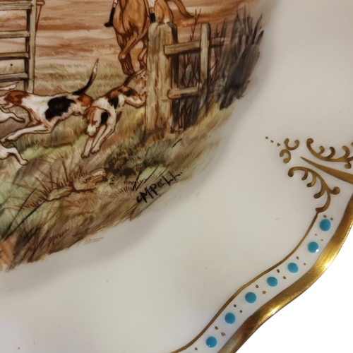 193 - ROYAL CROWN DERBY, A PAIR OF BONE CHINA CABINET PLATES
Hunting scene, both signed 'C.M. Pell', centr... 